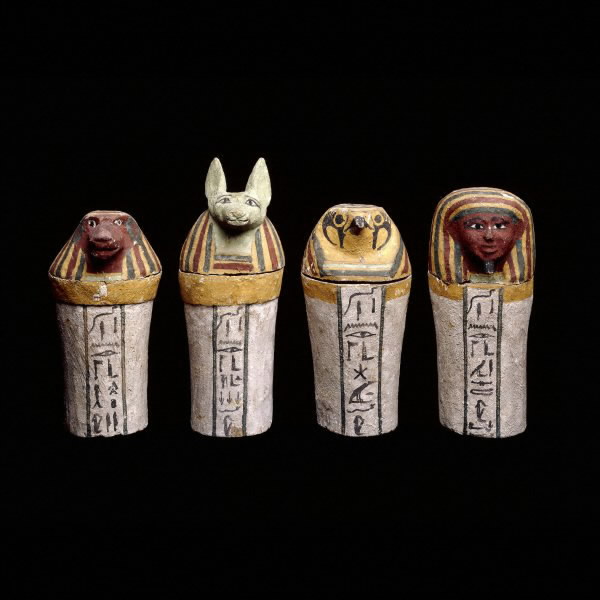 Painted wooden canopic jars