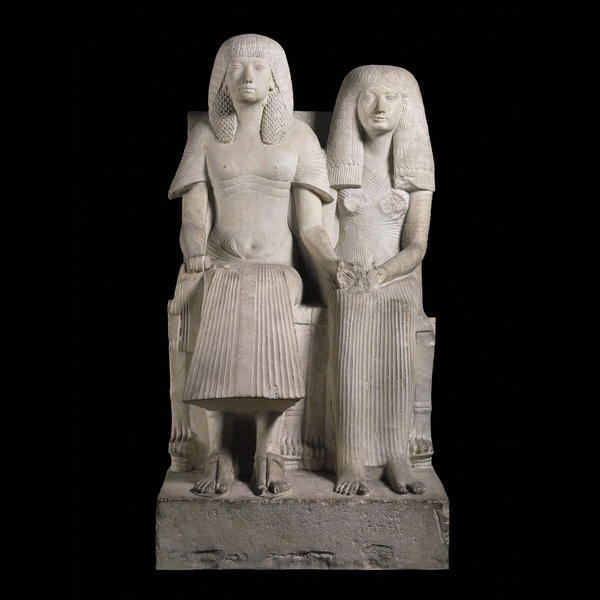 Limestone statue of a husband and wife